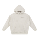 IMUSKOP Queens Acrostic Heavyweight Hoodie, oat gray, front with small IMUSKOP / QUEENS NY mark and orange bar on the left chest, borough coordinates above the left cuff